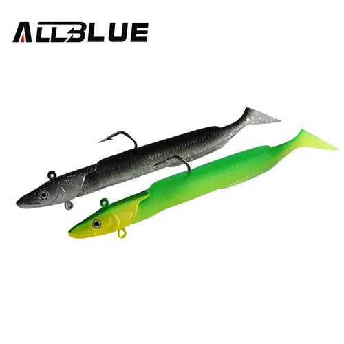 Soft paddle tail fishing lure pair: black/silver and green with treble hooks.