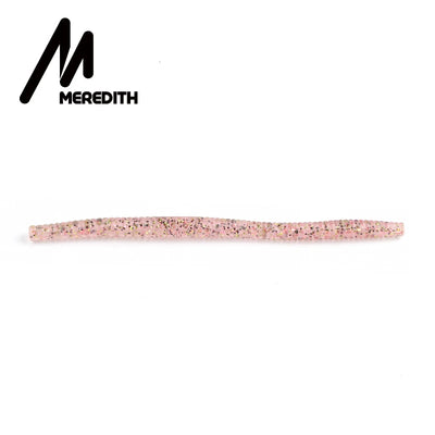 Light pink silicone worm fishing lure with mottled speckles