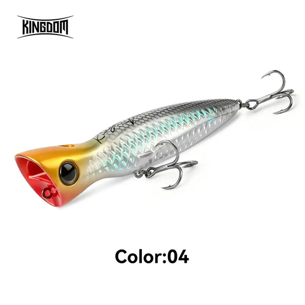 Silver and teal topwater popper lure with orange head and two treble hooks