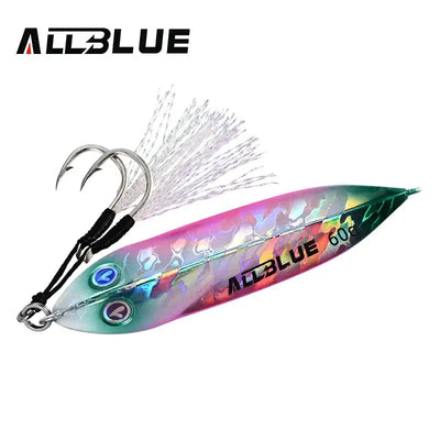 Metal jigging spoon with iridescent green-purple finish, silver feather tail, and treble hooks.