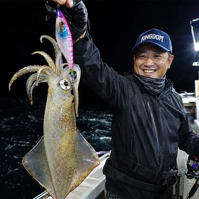 Luminous EGI squid jig with treble hooks attached to a squid catch