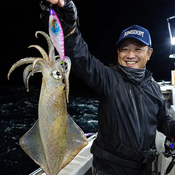 Luminous EGI squid jig with treble hooks attached to a squid catch