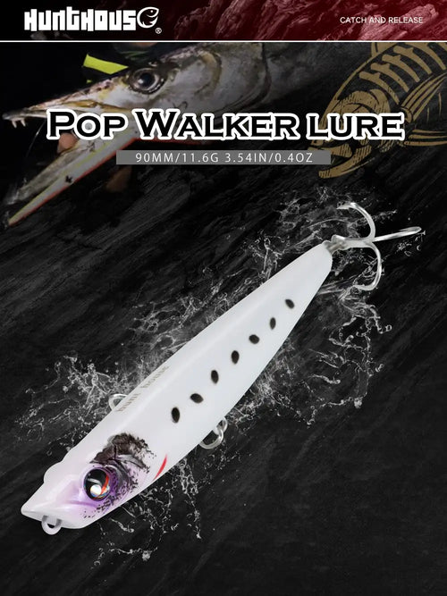 White pop walker topwater lure with purple face, black dot strip, two treble hooks