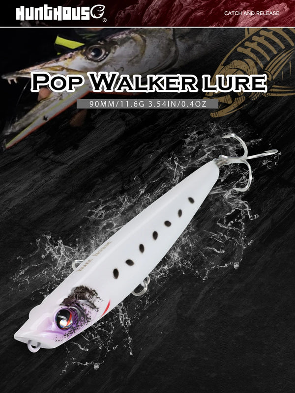White pop walker topwater lure with purple face, black dot strip, two treble hooks