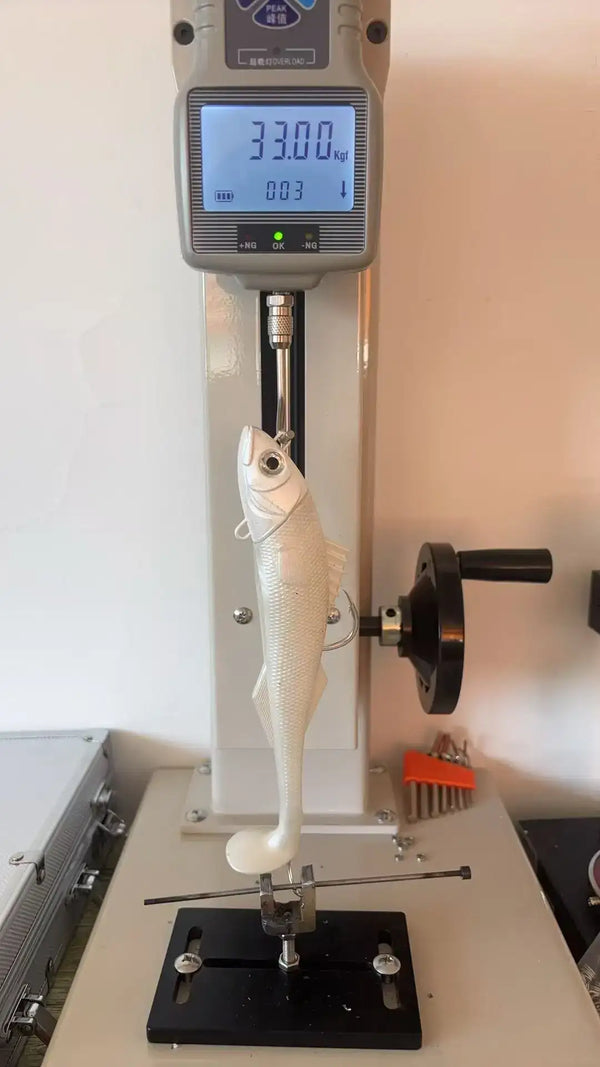 Soft swimbait lure standing on a digital scale with jig head and hook