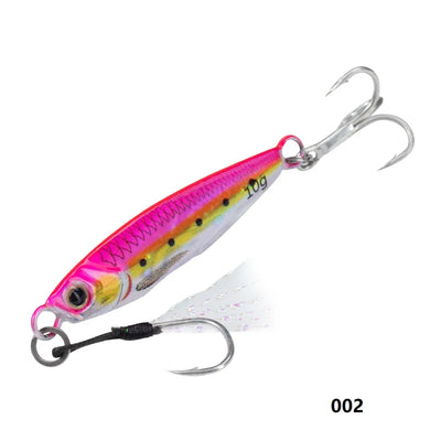 Metal jig fishing lure in pink and white with yellow spots and two treble hooks.
