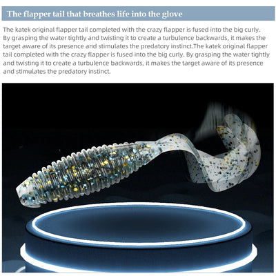 Curved soft flapper grub lure with white-and-blue speckled paddle tail