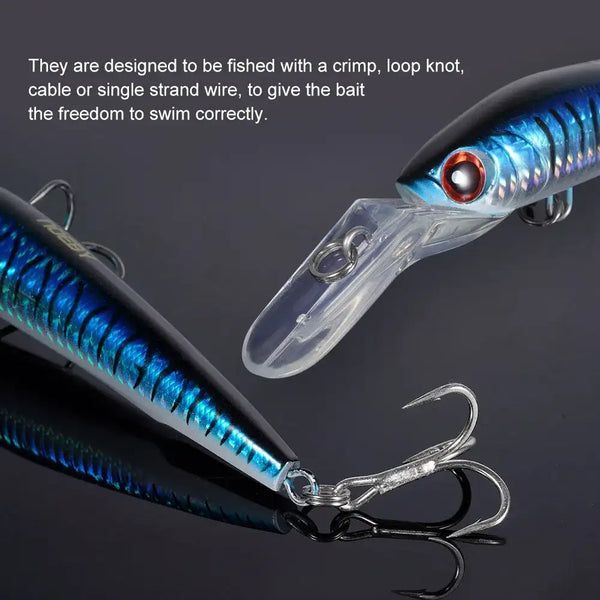 Two sinking trolling minnow lures with blue and dark bodies, clear lip, and treble hooks