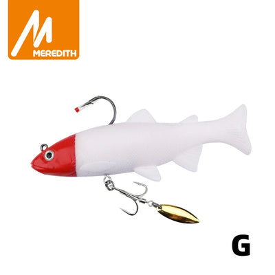 Soft swimbait lure with red head and white body, gold spinner blade and treble hook