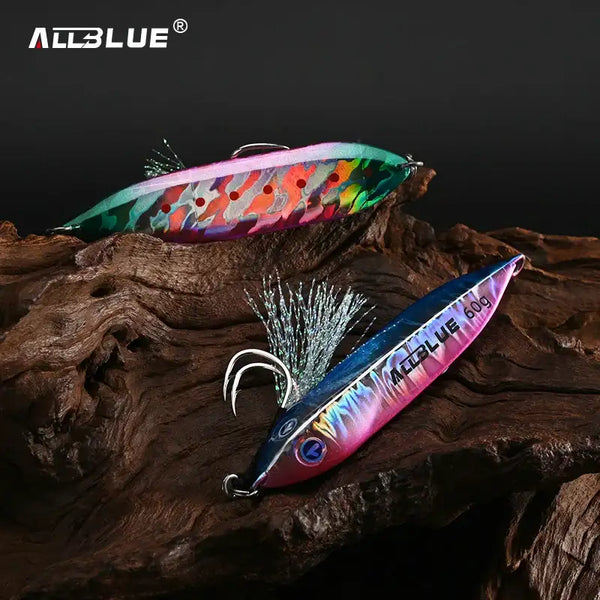 Metal jigging spoon with multicolor holographic body, silver feather tail, and treble hooks.