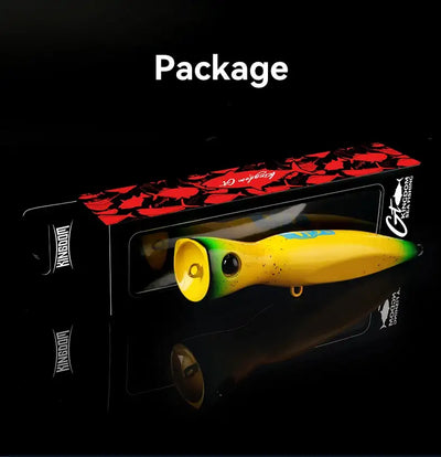 Yellow popper fishing lure shown in retail package with clear window
