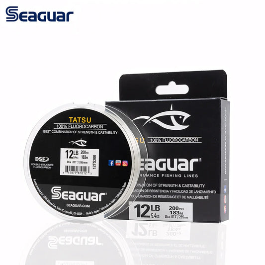 Seaguar Tatsu fluorocarbon fishing line spool with 12 lb label and black retail box