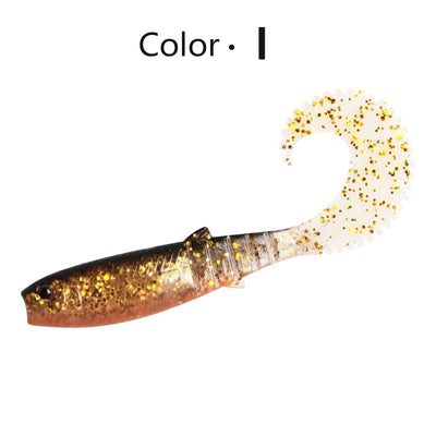 Soft shad silicone fishing lure, dark gold and speckled glitter, curved paddle tail
