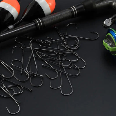 Assorted barbed metal fishing hooks in mixed sizes