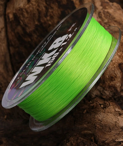 Green braided fishing line spool with clear top rim