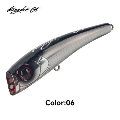 Kingdom GT popper lure, dark gray floating topwater with red-eyed detail and hook