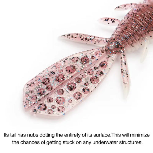 Pink Nebula shrimp soft lure close-up with glitter inlays, translucent legs, and forked tail.
