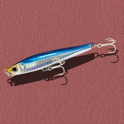 Blue metallic lipless minnow sinking lure with iridescent sides and treble hooks