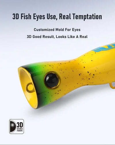 Yellow and green speckled popper lure with 3D-style fish eye and front skirt