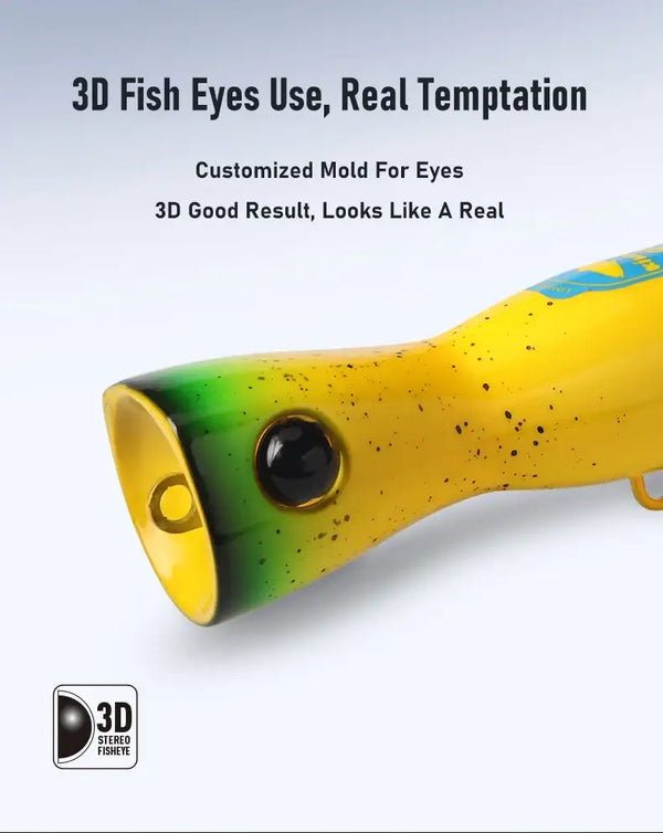 Yellow and green speckled popper lure with 3D-style fish eye and front skirt