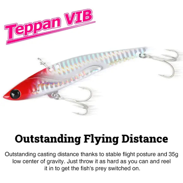 Metal vibration fishing lure, white and red striped body with treble hooks