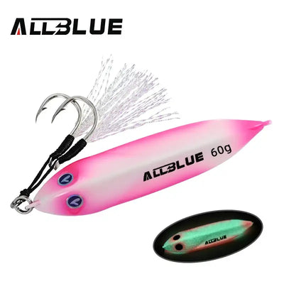Metal jigging spoon with pink body, silver feather tail, treble hooks, and dark underside insert.