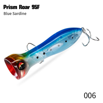 Floating topwater lure, blue sardine color with black spots and treble hooks