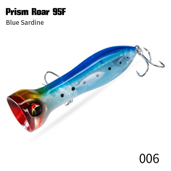 Floating topwater lure, blue sardine color with black spots and treble hooks