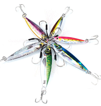 Five metal minnow jig lures with multicolor bodies and treble hooks