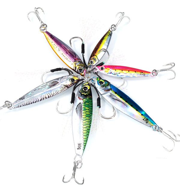 Five metal minnow jig lures with multicolor bodies and treble hooks