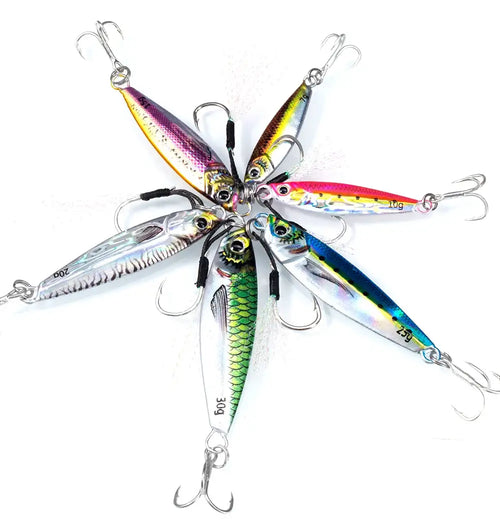 Mixed-color metal jig lure set with treble hooks, fanned together on a white background