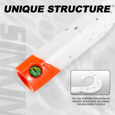 White soft lure tail with black speckles and orange head sleeve, perforated.