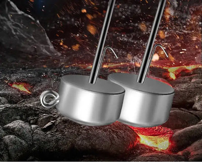 Two metal jig head hooks with curved barbed shanks and round lead bodies