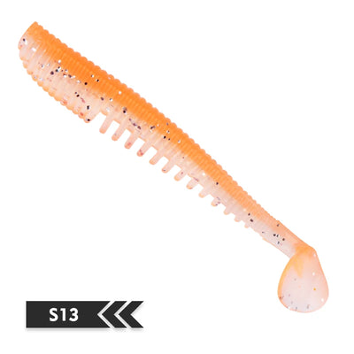Soft fishing lure, orange translucent shad-style silicone bait, ribbed body, tapered tail