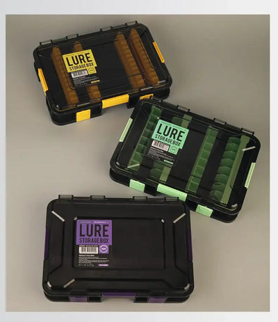 Waterproof lure storage box with black shell, green and purple removable compartments