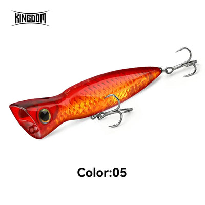 Red and orange topwater popper lure with two treble hooks