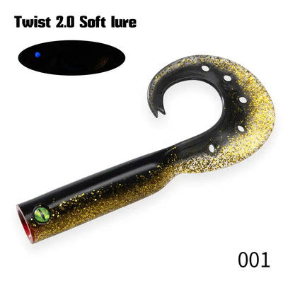 Black and gold glitter soft lure with round eye and curved trailer tail