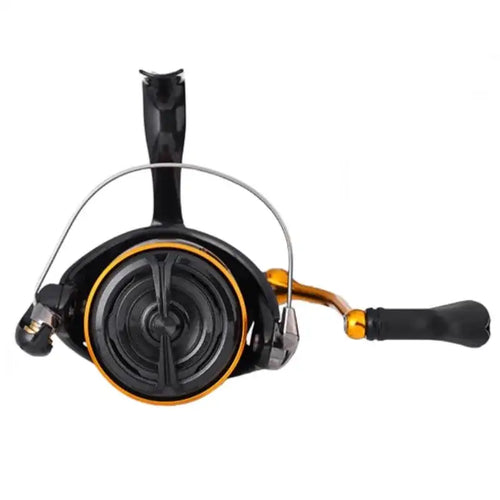 Black and gold spinning reel top view with orange spool edge and line bail