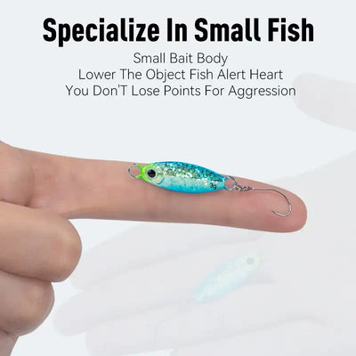 Micro metal jig fishing lure in hand, turquoise-blue glitter body with green eye single hook
