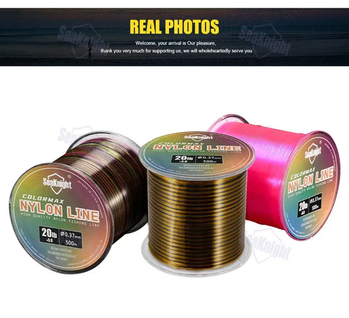 Assorted color nylon fishing line spools with product boxes.
