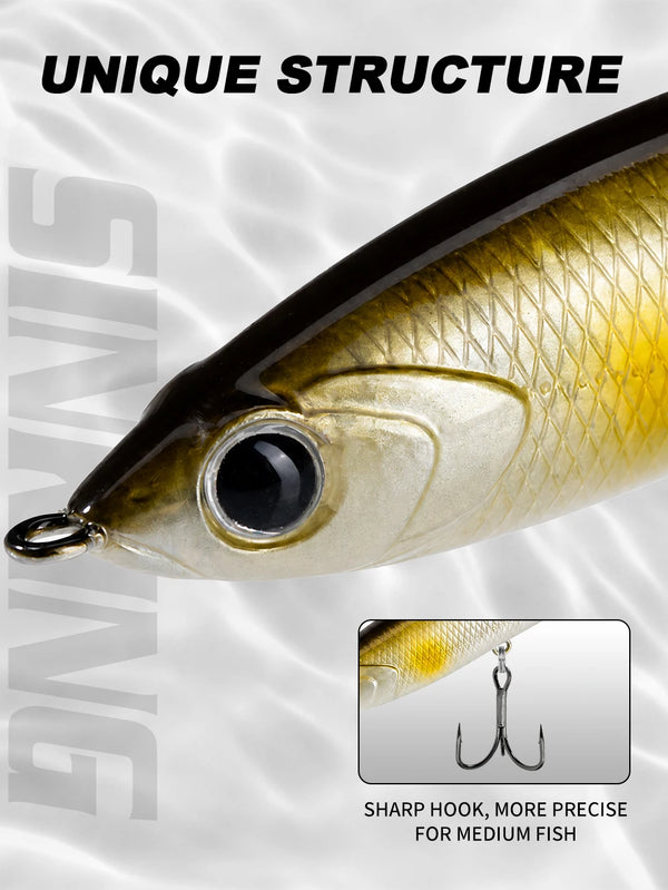 Close-up of yellow-gold floating pencil lure with round eye and front hook