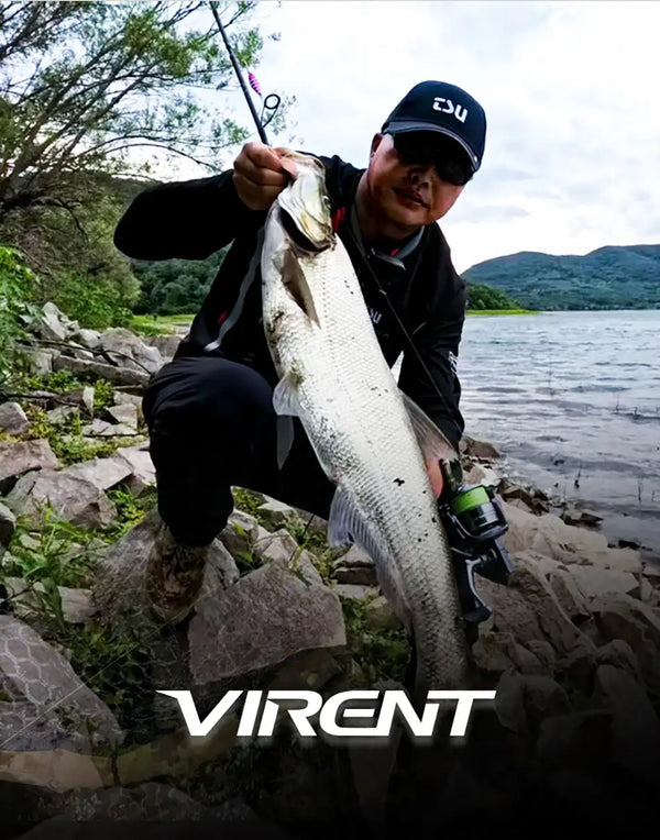 Spinning reel in use as an angler holds a large fish outdoors