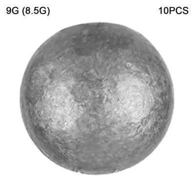 Large dark gray round lead ball sinker with speckled texture and small hole