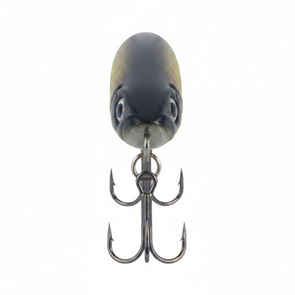 Fishing stickbait lure front view, dark head and yellow-green body, twin treble hooks