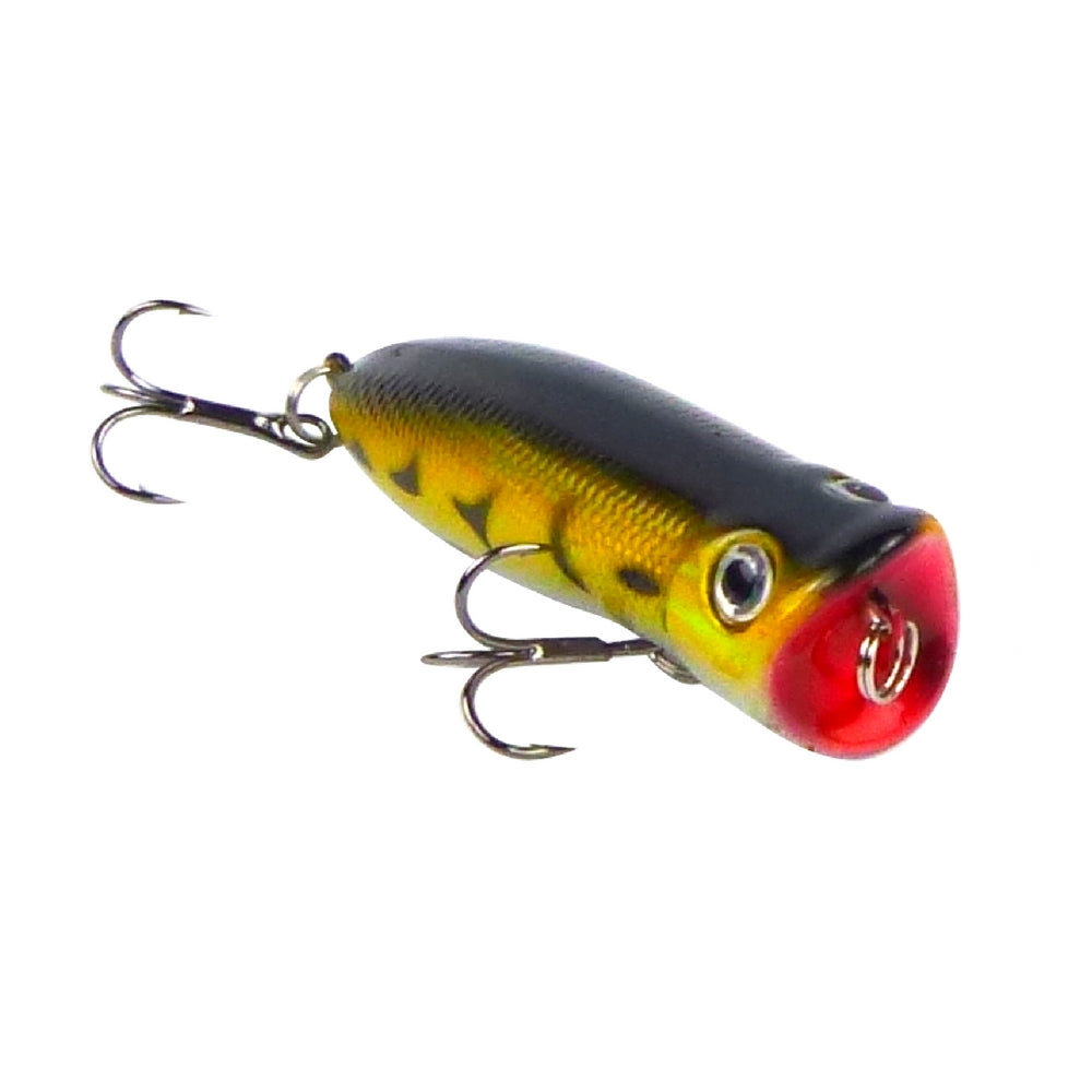 Surface popper fishing lure with black-gray back, yellow sides, red mouth and treble hooks