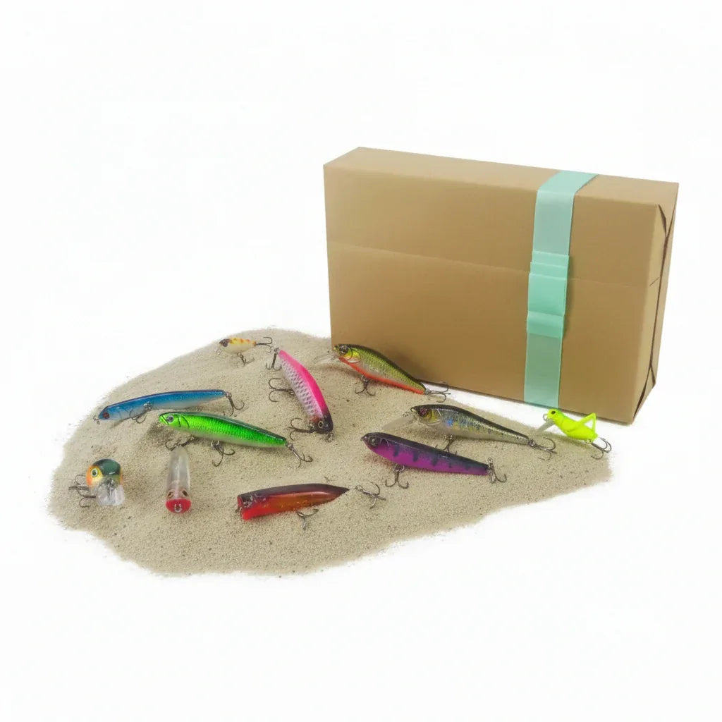 Fishing lure gift set with multicolor surface lures and brown box with teal strap