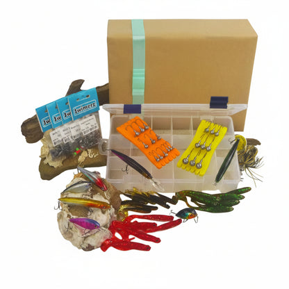 Fishing tackle gift set with clear compartment box and colorful lures, hooks, and weights