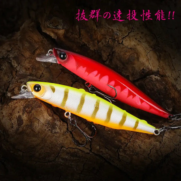 Suspending jerkbait minnow lure with red, yellow, and white stripe pattern, treble hooks