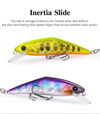 Yellow-green sinking minnow fishing lure with black pattern and silver treble hooks