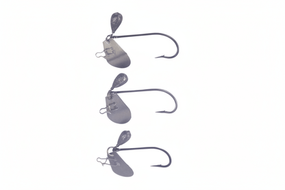 Blade jig heads with straight hooks and blades, dark gray, 3-pack shown from side